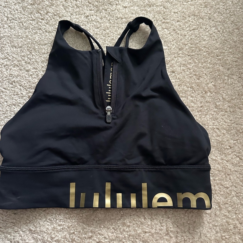 Lululemon black zip high neck Energy Bra. Tried on only, never used.
